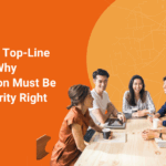 A group of marketers sitting at a table having a meeting